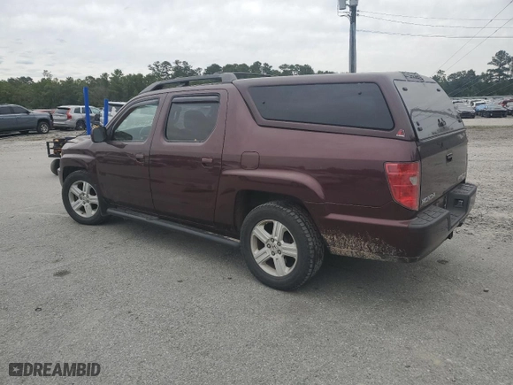 2011 Honda Ridgeline RTL with VIN 5FPYK1F58BB006887, listed as a Copart auction lot 75165964 with 153,615 mi miles and Salvage Title. Bid and sale history available at carsss.com. Image 2.