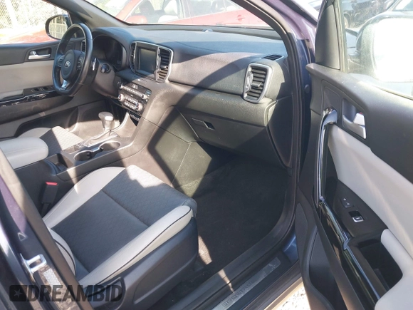 2019 Kia Sportage EX with VIN KNDPNCAC7K7615908, listed as a IAAI auction lot 42004220 with 86,654 mi miles. Bid and sale history available at carsss.com. Image 5.