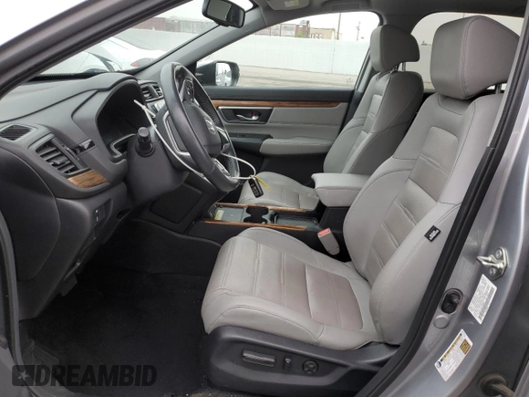 2020 Honda CR-V Touring z VIN 7FARW1H96LE006653, wystawiony jako Copart lot #57167475 z przebiegiem 49 286 mil mil oraz Szkoda całkowita • Salvage title. Historia ofert i sprzedaży dostępna na DreamBid. Obrazek 7.