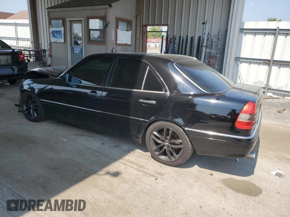 1996 Mercedes-Benz C with VIN WDBHA28E1TF402525, listed as a Copart auction lot 69050504 with 178,492 mi miles and Salvage Title. Bid and sale history available at carsss.com. Image 2.