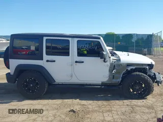 2018 Jeep Wrangler Unlimited Sport S with VIN 1C4HJWDG8JL928813, listed as a IAAI auction lot 42281021 with 71,001 mi miles and . Bid and sale history available at DreamBid. Image 14.