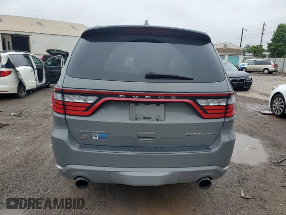 2022 Dodge Durango Citadel Anodized Platinum with VIN 1C4RDJEG0NC133046, listed as a Copart auction lot 60729085 with 73,085 mi miles and Salvage title. Bid and sale history available at DreamBid. Image 6.