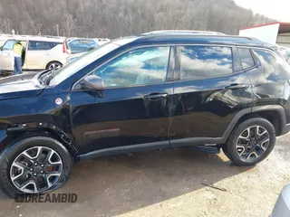 2019 Jeep Compass Trailhawk with VIN 3C4NJDDBXKT671364, listed as a IAAI auction lot 41655974 with 104,252 mi miles and . Bid and sale history available at carsss.com. Image 15.