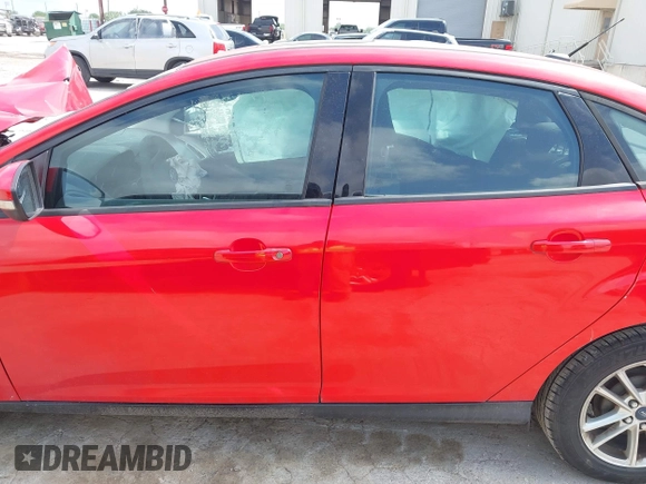 2015 Ford Focus SE z VIN 1FADP3F23FL233620, wystawiony jako IAAI lot #42073204 z przebiegiem 129 109 mil mil oraz . Historia ofert i sprzedaży dostępna na DreamBid. Obrazek 14.