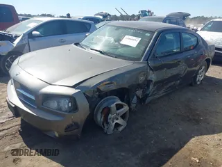 2009 Dodge Charger SXT with VIN 2B3KA33V29H627209, listed as a IAAI auction lot 41666032 with 189,916 mi miles and . Bid and sale history available at carsss.com. Image 2.