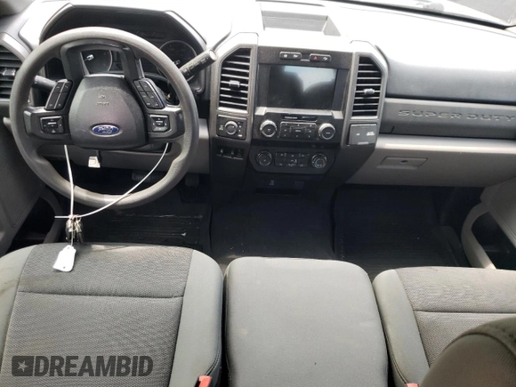 2020 Ford F-250 XL with VIN 1FT8W2BTXLEE30615, listed as a Copart auction lot 60626295 with 142,318 mi miles and Salvage title. Bid and sale history available at DreamBid. Image 8.