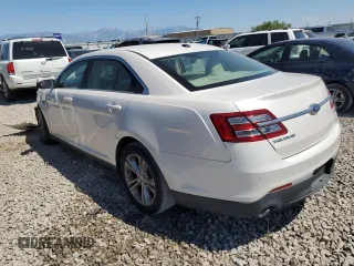 2015 Ford Taurus SEL z VIN 1FAHP2E8XFG181929, wystawiony jako Copart lot #64022325 z przebiegiem 106 272 mil mil oraz Szkoda całkowita • Salvage title. Historia ofert i sprzedaży dostępna na DreamBid. Obrazek 2.