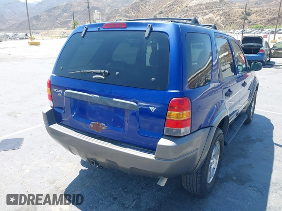 2005 Ford Escape XLT with VIN 1FMYU03155KB63374, listed as a IAAI auction lot 42739496 with 128,768 mi miles and . Bid and sale history available at DreamBid. Image 4.