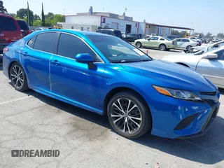 2018 Toyota Camry LE z VIN 4T1B11HK7JU062809, wystawiony jako IAAI lot #42386411 z przebiegiem 80 364 mil mil oraz . Historia ofert i sprzedaży dostępna na DreamBid. Obrazek 1.
