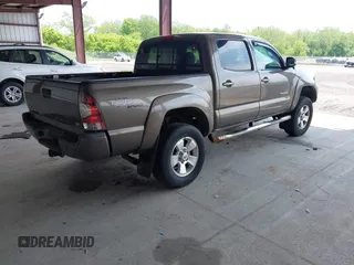 2013 Toyota Tacoma with VIN 3TMLU4EN4DM118438, listed as a IAAI auction lot 42285446 with 162,751 mi miles and . Bid and sale history available at DreamBid. Image 4.