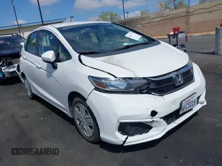 2019 Honda Fit LX z VIN 3HGGK5H45KM701986, wystawiony jako IAAI lot #42116771 z przebiegiem 72 326 mil mil oraz . Historia ofert i sprzedaży dostępna na DreamBid. Obrazek 1.