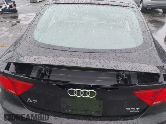 2014 Audi A7 3.0 Prestige with VIN WAU2GAFC5EN090233, listed as a IAAI auction lot 41565942 with 199,890 mi miles. Bid and sale history available at carsss.com. Image 6.