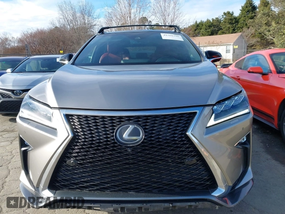 2018 Lexus RX 350 z VIN 2T2BZMCA0JC140434, wystawiony jako IAAI lot #41568796 z przebiegiem 104 143 mil mil oraz . Historia ofert i sprzedaży dostępna na DreamBid. Obrazek 12.