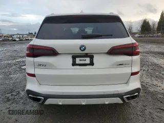 2022 BMW X5 xDrive45e with VIN 5UXTA6C0XN9L16712, listed as a Copart auction lot 45420585 with 20,526 mi miles and Salvage Title. Bid and sale history available at carsss.com. Image 6.