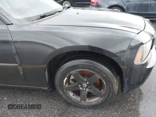 2010 Dodge Charger SXT with VIN 2B3CA3CV5AH234166, listed as a IAAI auction lot 42086386 with 120,368 mi miles. Bid and sale history available at carsss.com. Image 6.