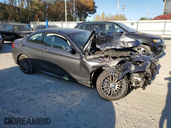 2015 BMW 2 Series M235i xDrive with VIN WBA1J9C56FV371010, listed as a Copart auction lot 77425014 with 269,033 mi miles and Clean Title. Bid and sale history available at carsss.com. Image 4.