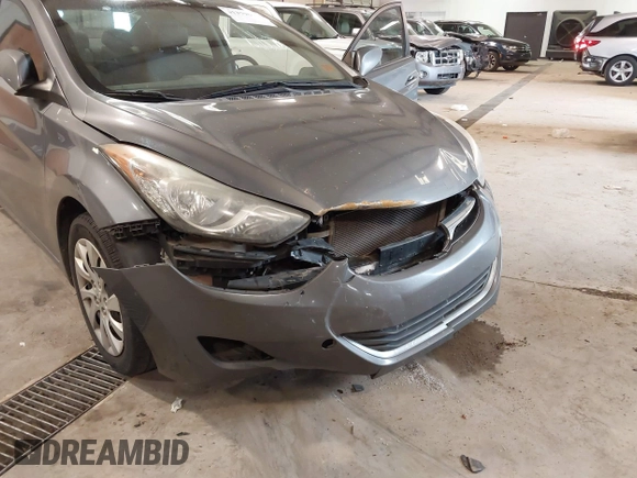 2012 Hyundai Elantra Limited z VIN 5NPDH4AE4CH124730, wystawiony jako IAAI lot #41379631 z przebiegiem 175 790 mil mil oraz . Historia ofert i sprzedaży dostępna na DreamBid. Obrazek 6.