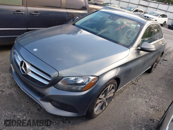 2017 Mercedes-Benz C 300 with VIN 55SWF4JB7HU197874, listed as a IAAI auction lot 42062129 with 109,685 mi miles and . Bid and sale history available at carsss.com. Image 2.