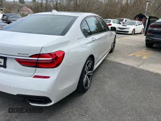 2018 BMW 7 Series 750i xDrive with VIN WBA7F2C55JB238347, listed as a Copart auction lot 54362255 with 63,360 mi miles and Clean Title. Bid and sale history available at carsss.com. Image 4.
