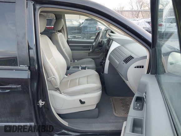 2008 Dodge Grand Caravan SXT with VIN 2D8HN54P48R827298, listed as a IAAI auction lot 41972302 with 199,903 mi miles and . Bid and sale history available at DreamBid. Image 5.