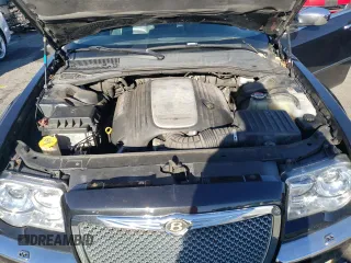 2005 Chrysler 300 300C AWD z VIN 2C3AK63H65H671814, wystawiony jako Copart lot #82867974 z przebiegiem 153 186 mil mil oraz Nie do naprawy. Historia ofert i sprzedaży dostępna na DreamBid. Obrazek 11.