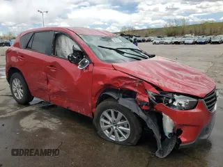 2016 Mazda CX-5 Touring with VIN JM3KE4CYXG0680266, listed as a Copart auction lot 55215755 with Not Provided miles and Non Repairable. Bid and sale history available at carsss.com. Image 4.