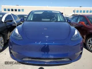 2023 Tesla Model Y Long Range with VIN 7SAYGAEE6PF689615, listed as a Copart auction lot 50999385 with 16,514 mi miles and Salvage Title. Bid and sale history available at DreamBid. Image 5.