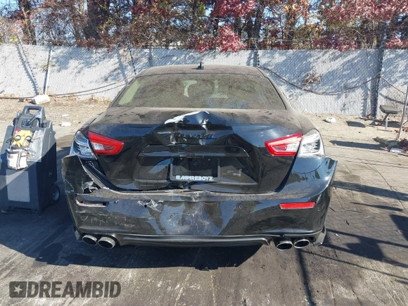 2014 Maserati Ghibli S Q4 z VIN ZAM57RTA9E1106695, wystawiony jako IAAI lot #40783416 z przebiegiem 92 885 mil mil oraz . Historia ofert i sprzedaży dostępna na DreamBid. Obrazek 16.