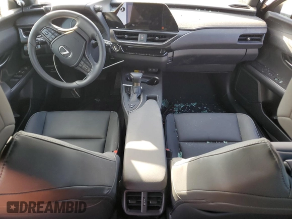 2024 Lexus UX with VIN JTHX6JBH9R2189737, listed as a Copart auction lot 77551214 with 0 mi miles and Salvage Title. Bid and sale history available at carsss.com. Image 8.