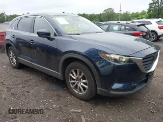 2019 Mazda CX-9 Touring with VIN JM3TCBCY6K0334898, listed as a IAAI auction lot 42467677 with 69,454 mi miles and . Bid and sale history available at DreamBid. Image 1.