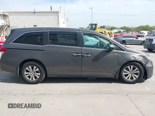 2014 Honda Odyssey EX-L with VIN 5FNRL5H67EB106183, listed as a IAAI auction lot 42210600 with 196,166 mi miles and . Bid and sale history available at DreamBid. Image 13.