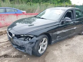 2014 BMW 3 Series 320i with VIN WBA3B1C52EK135610, listed as a IAAI auction lot 42274086 with 69,536 mi miles and . Bid and sale history available at DreamBid. Image 6.