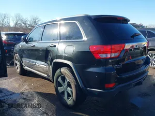 2011 Jeep Grand Cherokee 70th Anniversary with VIN 1J4RR4GT8BC504618, listed as a IAAI auction lot 40993960 with 188,098 mi miles. Bid and sale history available at carsss.com. Image 3.