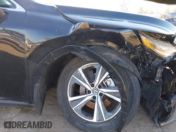 2023 Lexus RX 350 with VIN 2T2BAMBAXPC005107, listed as a IAAI auction lot 42287535 with 51,672 mi miles and . Bid and sale history available at DreamBid. Image 16.