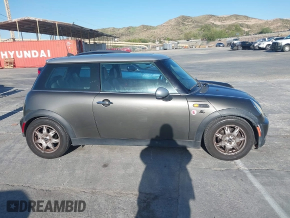 2006 MINI Hardtop with VIN WMWRC33586TJ75043, listed as a IAAI auction lot 41948235 with 138,402 mi miles and . Bid and sale history available at DreamBid. Image 13.