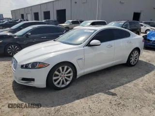 2014 Jaguar XF SC with VIN SAJWA0EX5E8U20229, listed as a Copart auction lot 65913374 with 92,817 mi miles and Non Repairable. Bid and sale history available at DreamBid. Image 1.