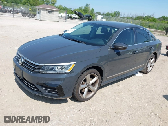 2016 Volkswagen Passat S with VIN 1VWAT7A31GC035276, listed as a IAAI auction lot 42525661 with 112,292 mi miles and . Bid and sale history available at DreamBid. Image 2.