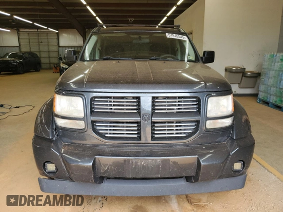 2011 Dodge Nitro Heat with VIN 1D4PU4GK8BW522783, listed as a Copart auction lot 54946545 with 215,804 mi miles and Salvage Title. Bid and sale history available at DreamBid. Image 5.