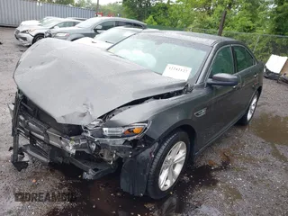 2018 Ford Taurus SEL z VIN 1FAHP2E85JG101221, wystawiony jako IAAI lot #42242127 z przebiegiem 123 787 mil mil oraz . Historia ofert i sprzedaży dostępna na DreamBid. Obrazek 2.