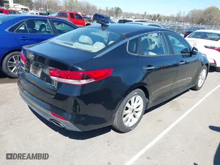 2016 Kia Optima LX with VIN 5XXGT4L3XGG013835, listed as a IAAI auction lot 41815349 with 120,628 mi miles. Bid and sale history available at carsss.com. Image 4.