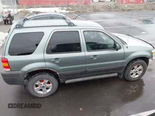 2006 Ford Escape XLT with VIN 1FMYU03126KC55897, listed as a IAAI auction lot 41733243 with 136,989 mi miles. Bid and sale history available at carsss.com. Image 13.