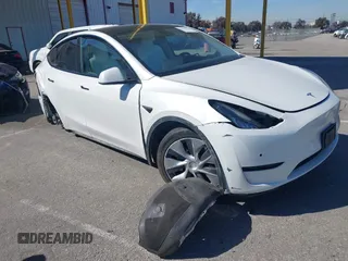 2020 Tesla Model Y Long Range with VIN 5YJYGDEE2LF044811, listed as a IAAI auction lot 41839136 with 68,445 mi miles and . Bid and sale history available at DreamBid. Image 1.