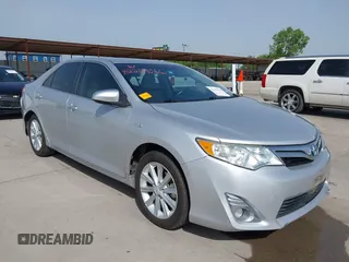 2012 Toyota Camry XLE z VIN 4T1BD1FKXCU021054, wystawiony jako IAAI lot #42269066 z przebiegiem 118 571 mil mil oraz . Historia ofert i sprzedaży dostępna na DreamBid. Obrazek 1.