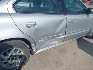 2003 Pontiac Grand Am SE1 with VIN 1G2NF52F03C278763, listed as a IAAI auction lot 42058886 with 226,926 mi miles. Bid and sale history available at carsss.com. Image 6.