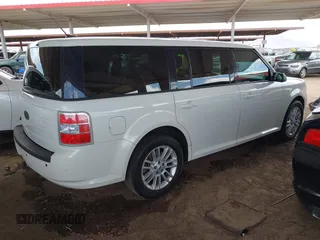 2012 Ford Flex SE with VIN 2FMGK5BC9CBD00535, listed as a IAAI auction lot 42015137 with 208,869 mi miles. Bid and sale history available at carsss.com. Image 4.