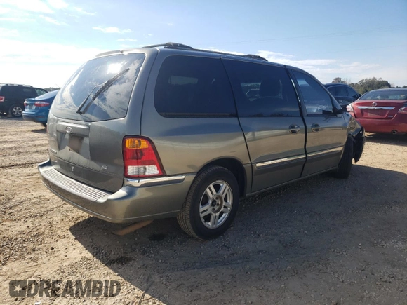 2002 Ford Windstar SE with VIN 2FMZA52462BA09199, listed as a Copart auction lot 83097064 with 216,158 mi miles and Salvage title. Bid and sale history available at DreamBid. Image 3.