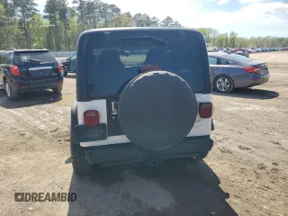 2003 Jeep Wrangler Rubicon z VIN 1J4FA69S73P333199, wystawiony jako Copart lot #50602615 z przebiegiem 133 254 mil mil oraz Szkoda całkowita • Salvage title. Historia ofert i sprzedaży dostępna na DreamBid. Obrazek 6.