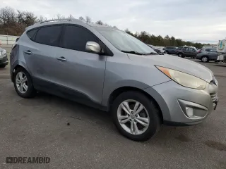 2013 Hyundai Tucson GLS with VIN KM8JU3AC2DU631636, listed as a Copart auction lot 53280025 with 205,311 mi miles and Non Repairable. Bid and sale history available at carsss.com. Image 4.