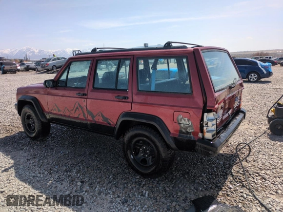1996 Jeep Cherokee Sport with VIN 1J4FJ68S6TL171056, listed as a Copart auction lot 52099555 with 250,089 mi miles and Salvage Title. Bid and sale history available at carsss.com. Image 2.