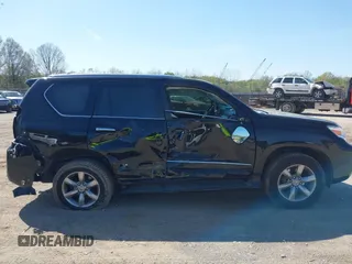 2013 Lexus GX 460 Premium z VIN JTJJM7FX8D5063276, wystawiony jako IAAI lot #41922536 z przebiegiem 162 110 mil mil oraz . Historia ofert i sprzedaży dostępna na DreamBid. Obrazek 13.
